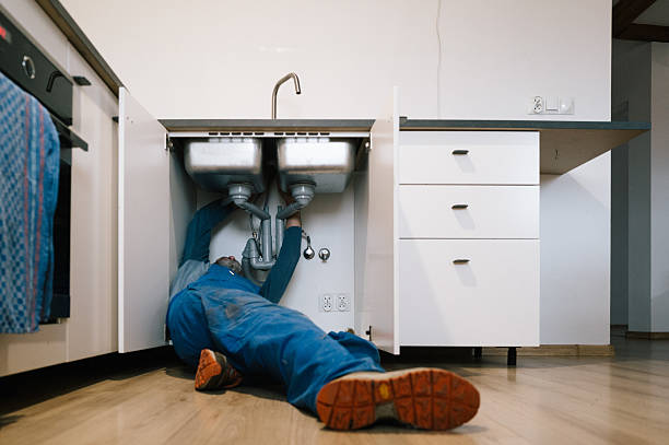 Professional Emergency Plumber technician working in Welch, MN